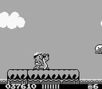 une photo d'Ã©cran de Adventure Island sur Nintendo Game Boy